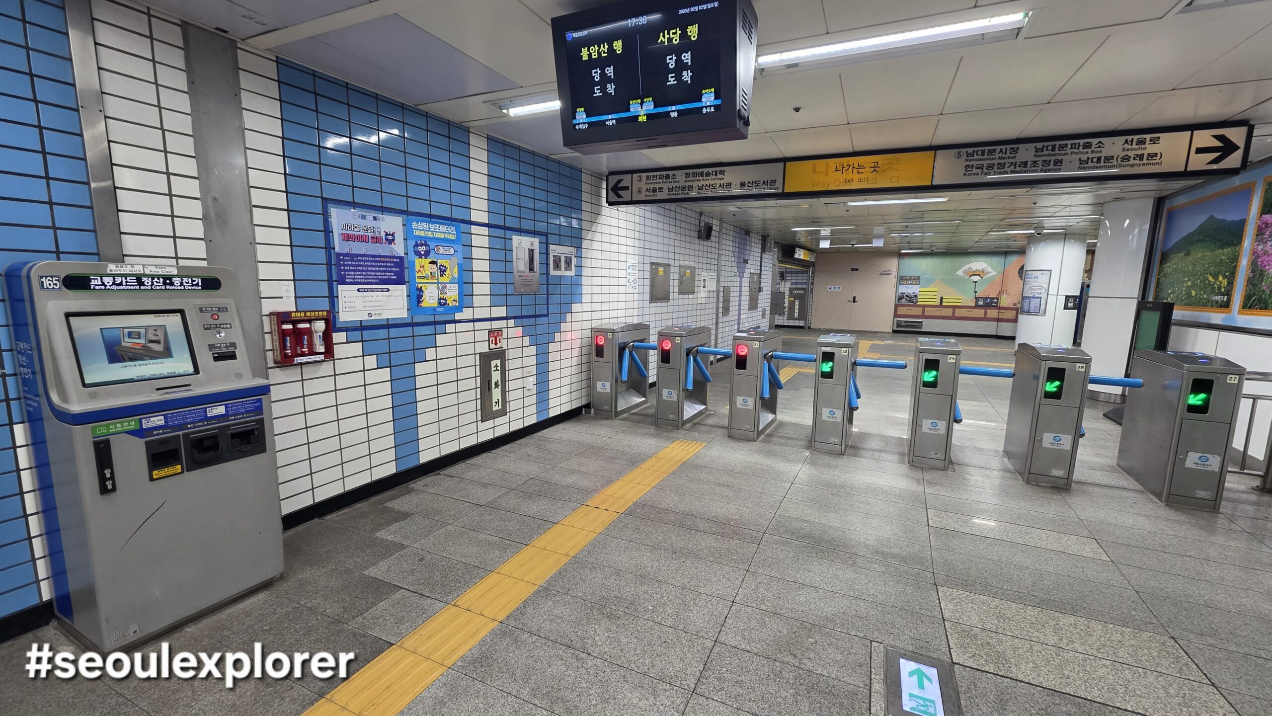 Modern ticket gates inside a Seoul Subway station for travelers