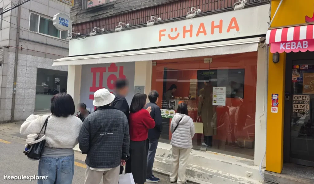 People lining up in front of FUHAHA Cream Bread shop