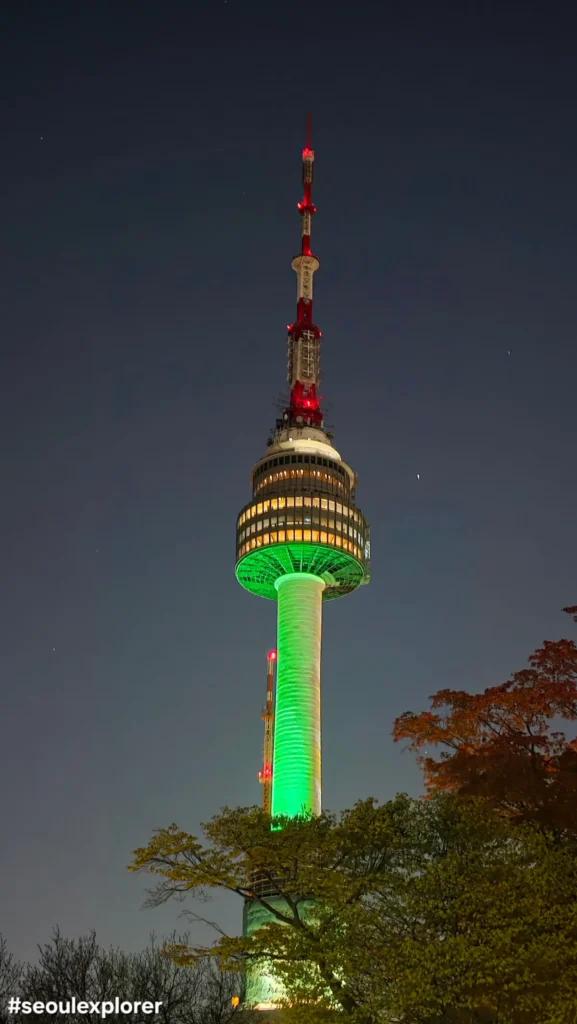 Namsan Seoul Tower green light indicating moderate air quality