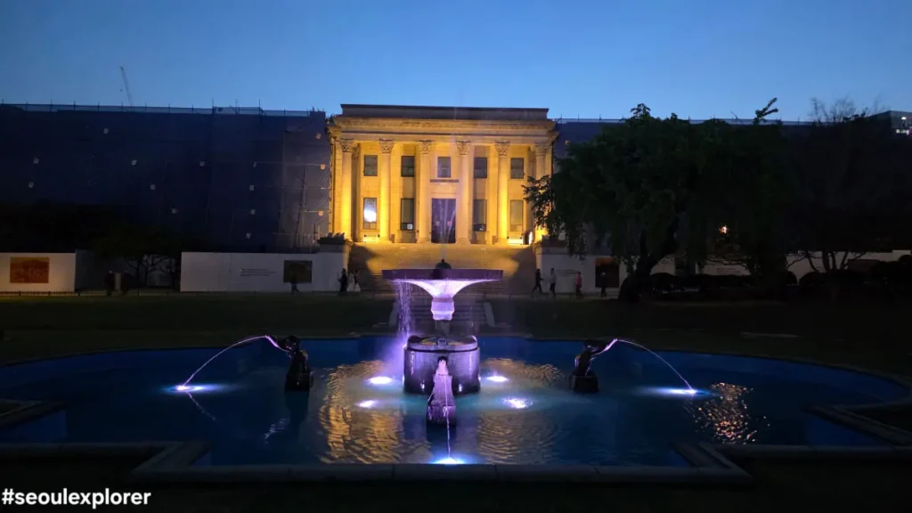 The lighted fountain and Seokjojeon Hall