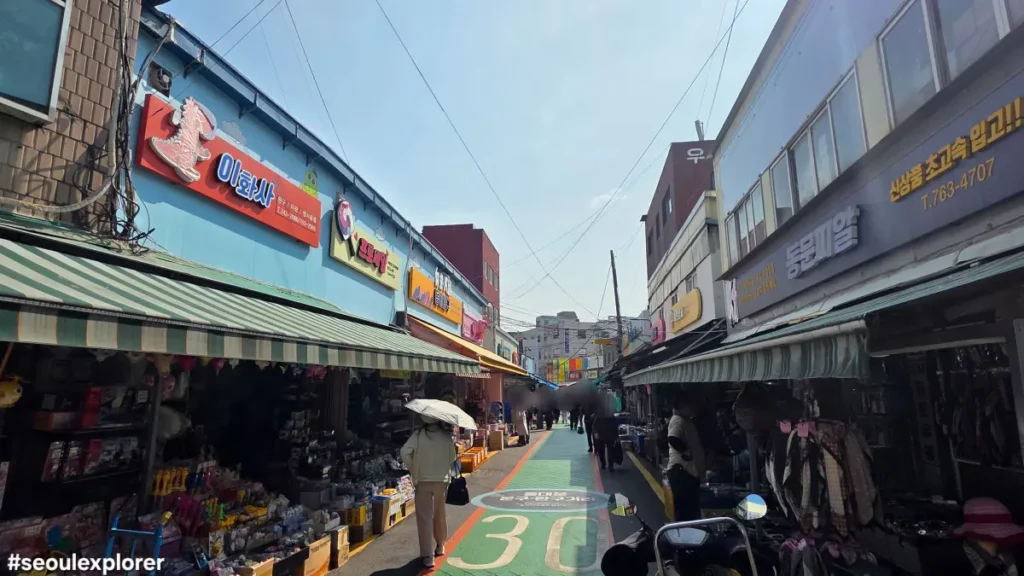 Busy street view of the toy and stationery shops in Changsin-dong