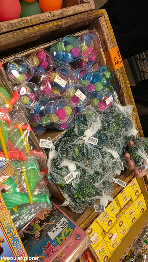 Old-school Korean marbles in containers