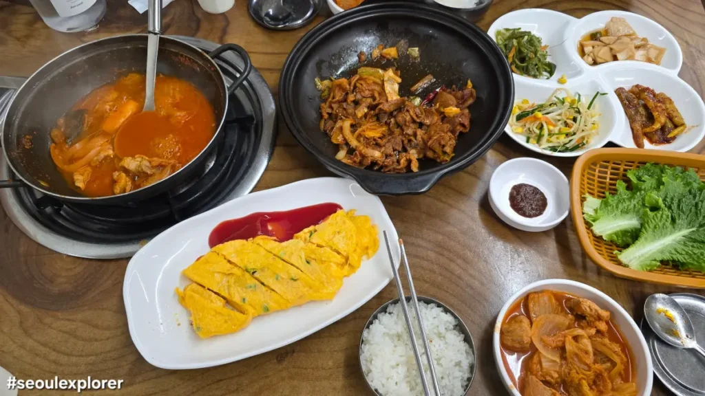 Korean local lunch with Kimchi-stew, Jeyuk, and omelet