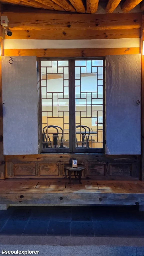 Table visible through the Hanok window